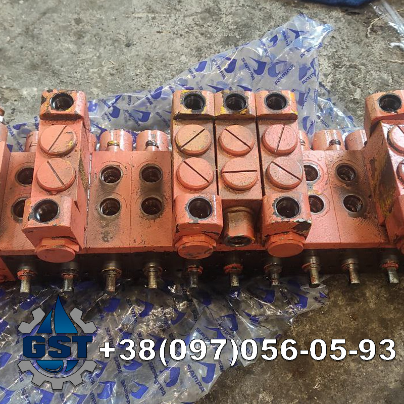 Ремонт гідророзподільника Bobcat 464
