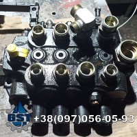 Ремонт гідророзподільника John Deere 318G