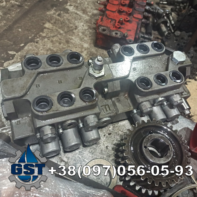 Ремонт гідророзподільника Bobcat 316