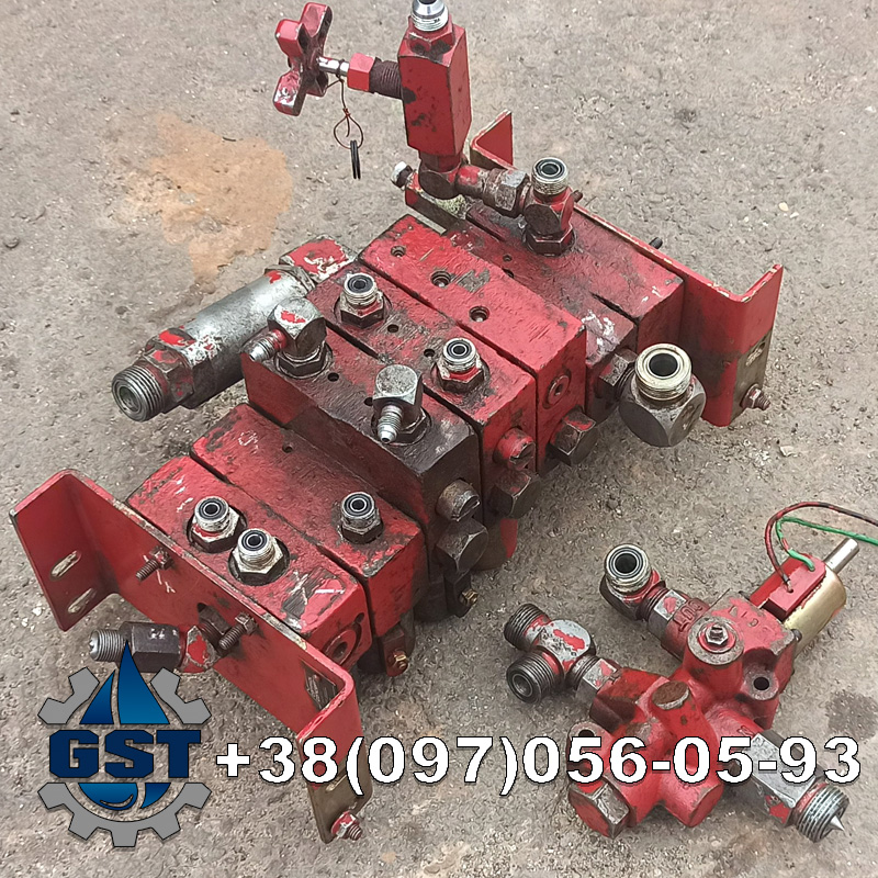 Ремонт гідророзподільника Bobcat 328