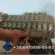 Ремонт гідророзподільника Komptech